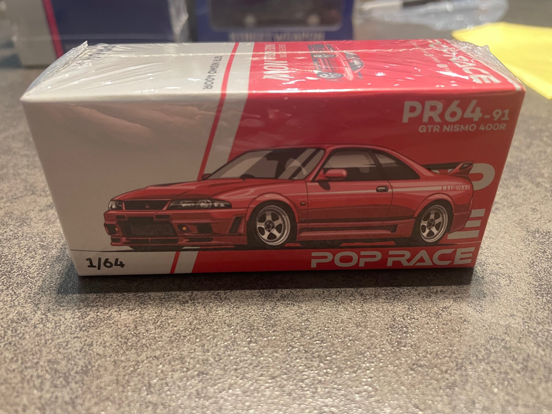 [PREORDEN] POP ​​RACE - 1/64 GT-R 400R ROJO - PR640091 