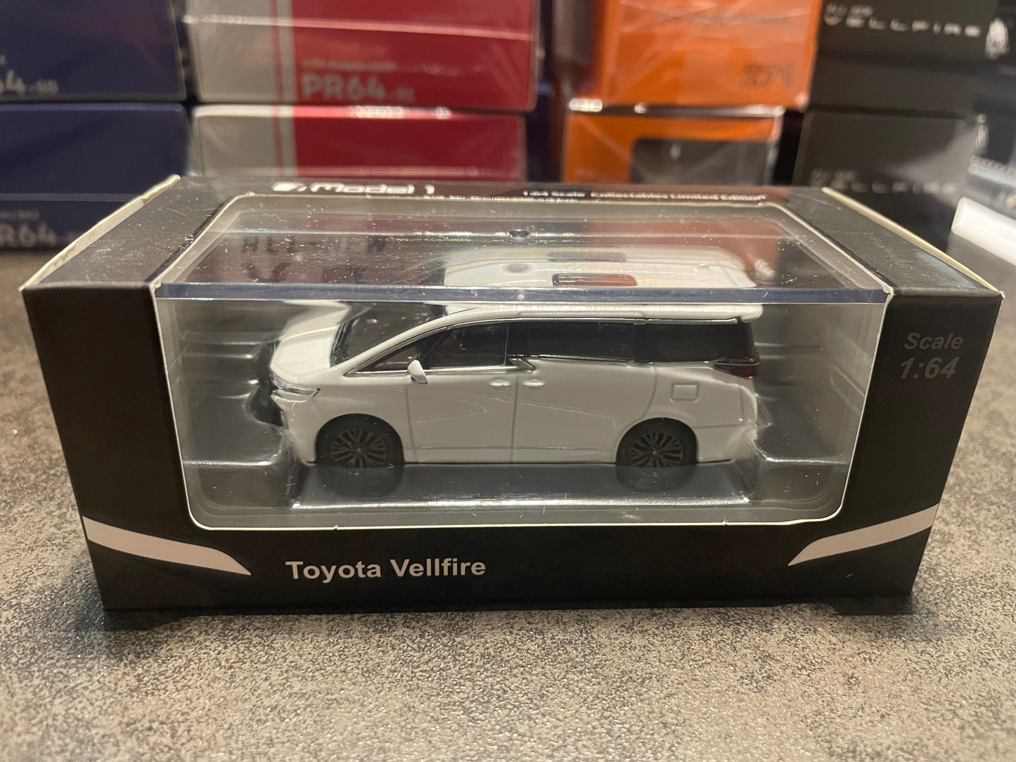 Model 1 - 1/64 Toyota Vellfire diecast model car - white:Toyota logo - RHD