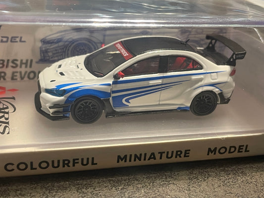 [PRÉCOMMANDE] MODÈLE CM 1/64 - Misubishi Lancer EvoX Varis Blanc /CM64-EVOX-09