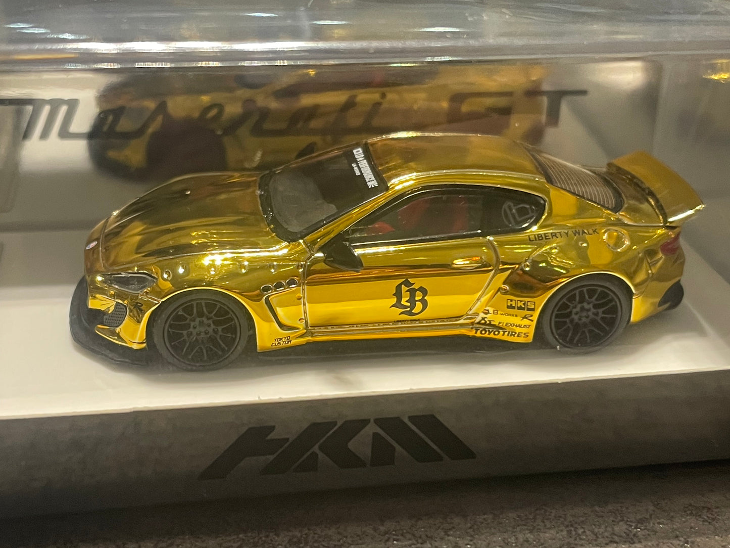 HKM 1/64 - Martha GranTurismo 1st generation Mk1 Sport version GTS M145 diecast model - Chrome Gold