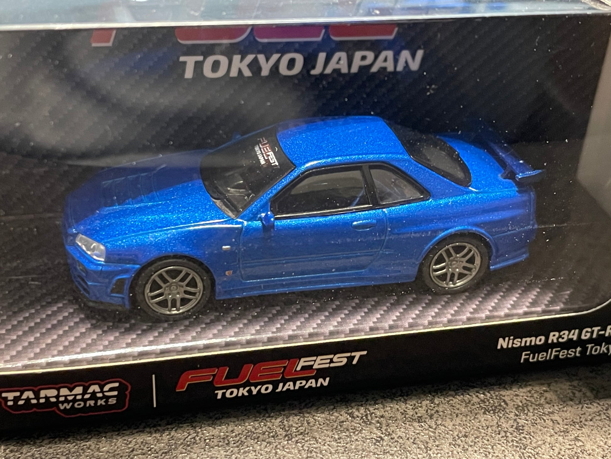 Schuco X Tarmac Works 1/64 Nismo R34 GT-R Z-tune FuelFest Tokyo 2023 - COLLAB64 - MODEL CAR UKMODEL CAR#INNO64##TARMAC##diecast_model#