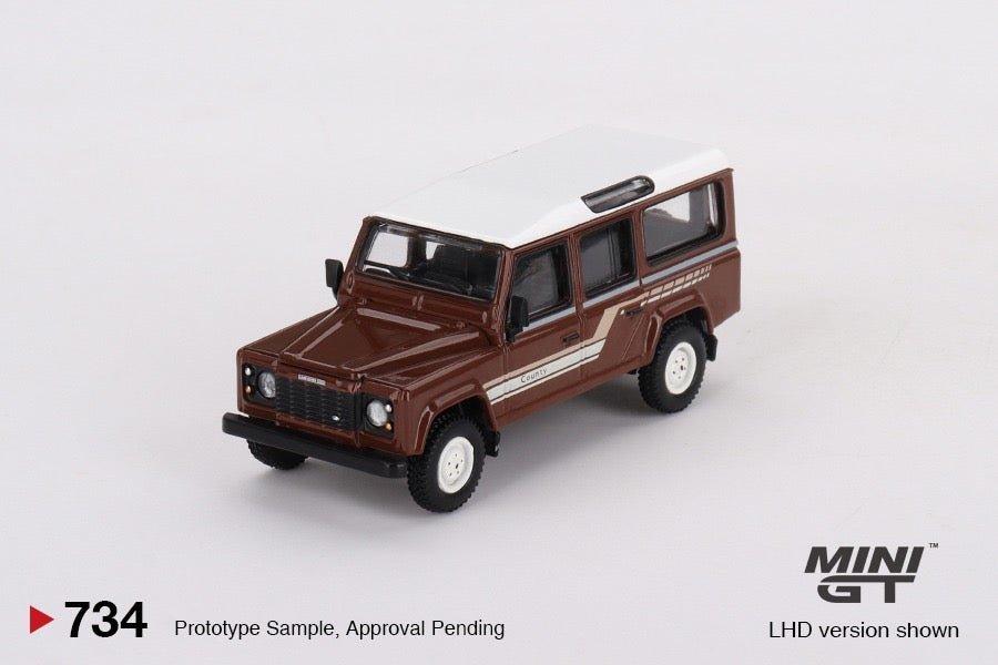 [PREORDEN] Mini GT 1/64 Land Rover Defender 110 1985 County Station Wagon Russet Brown LHD 