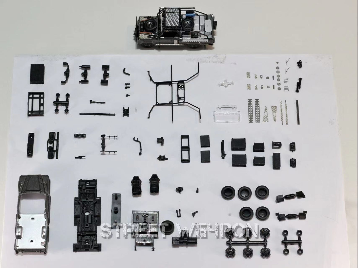 [ PREORDER ] STREET WEAPON SW - 1/64 Land Rover Defender Tomb Raider livery diecast model car - MODEL CARS UKMODEL CAR#INNO64##TARMAC##diecast_model#